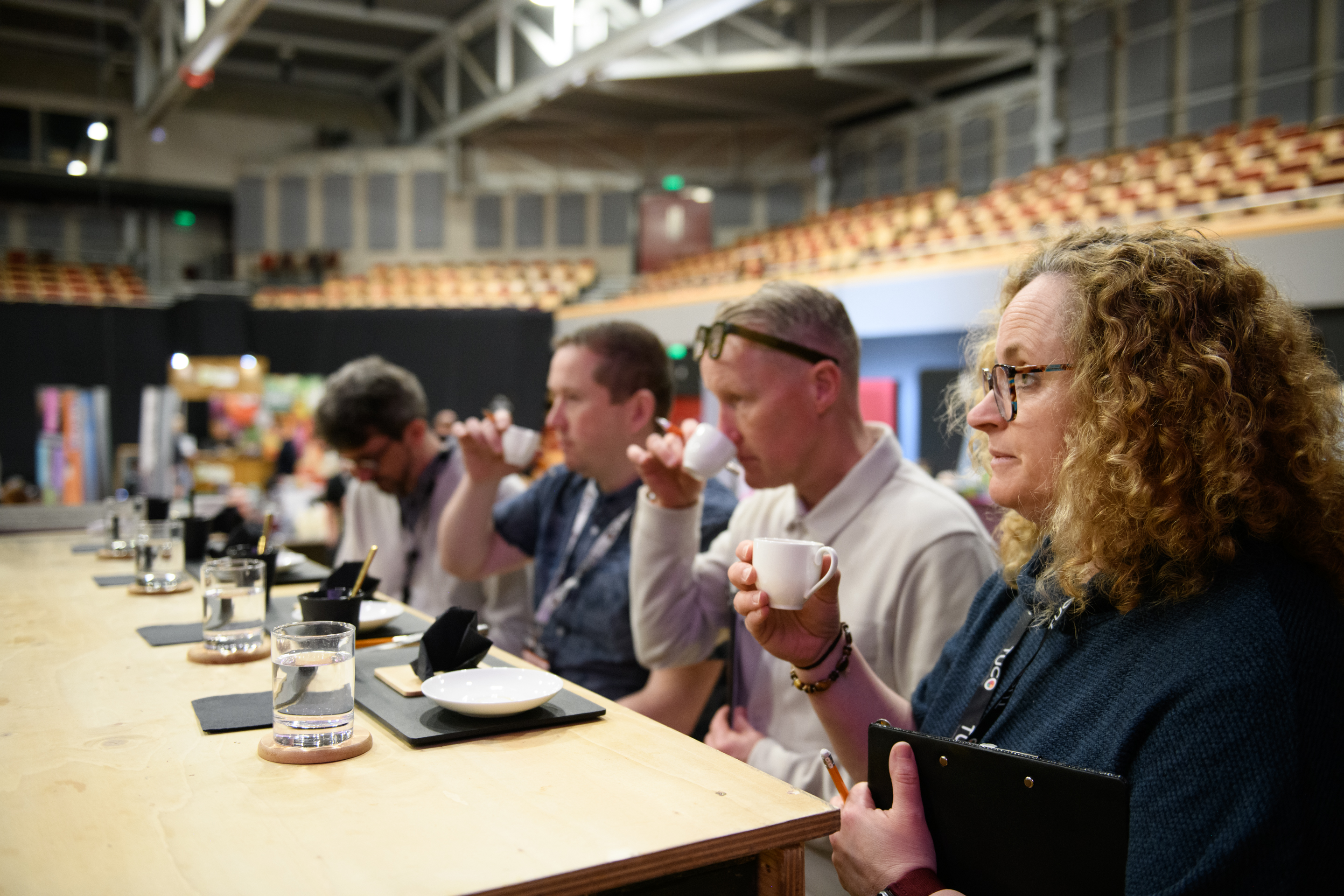 judges trying coffee at a table