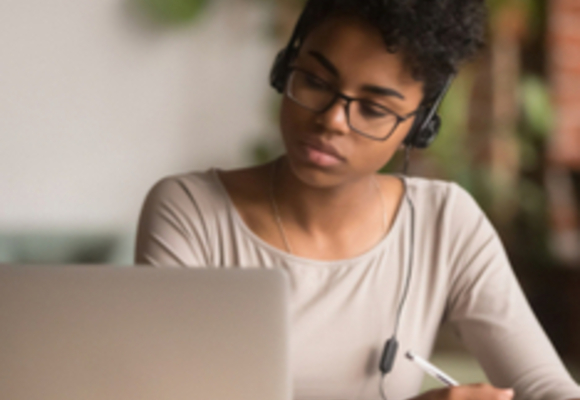 woman watching laptop