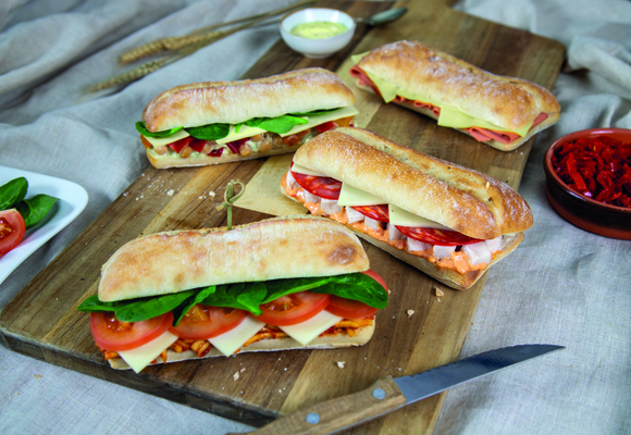 picture of ciabattas on a wooden chopping board