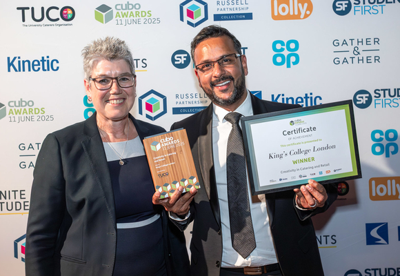 Amanda Pettingil awarding Manish Shah of KCL with a CUBO award